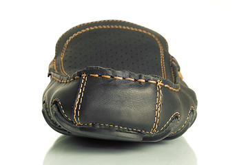 Image showing Close-up of single black mens moccasin