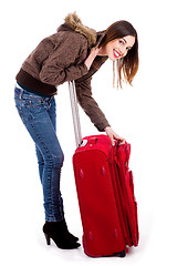 Image showing young lady unzipping her bag