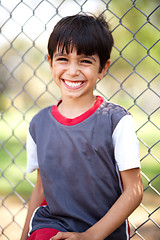 Image showing Close up shot of a happy boy laughing