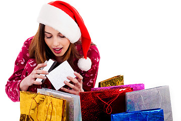 Image showing lady opening christmas gift box