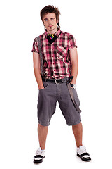 Image showing Cool young guy with hands in his pockets