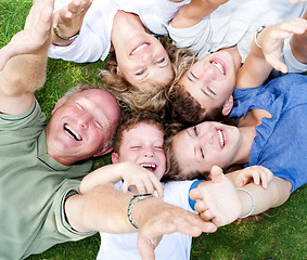 Image showing Happy family lying as a circle