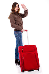 Image showing young woman waving hand