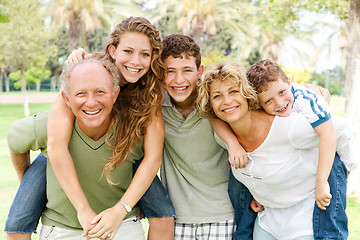 Image showing garandparents giving piggyback ride