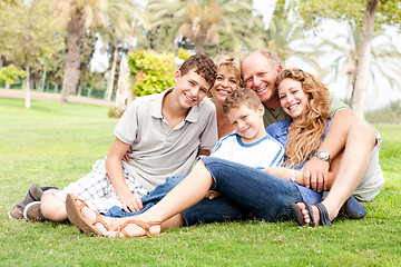 Image showing Happy family relaxing in the park