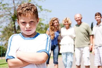 Image showing Extended family posing,young child on focus