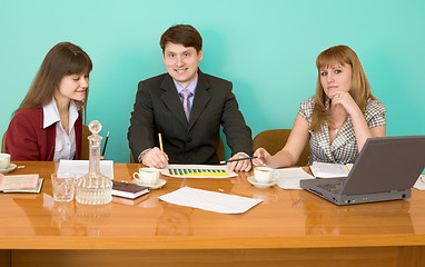 Image showing Business team sits at the table