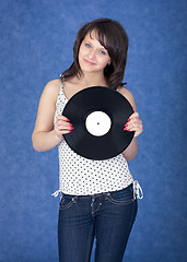 Image showing Lady with vinyl record