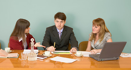 Image showing Business team sits at the table