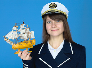 Image showing Portrait of the woman in a sea cap with the ship