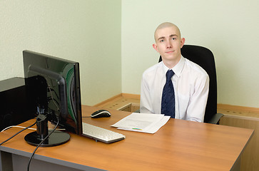 Image showing Businessman on a workplace