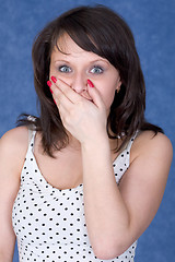 Image showing Young woman to be open-mouthed with surprise