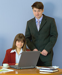 Image showing Girls at a desktop and their chief