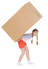Image showing Girl bears the big heavy cardboard box