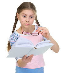 Image showing Girl with the book and eyeglasses