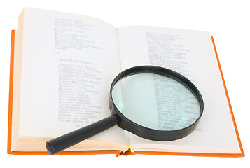 Image showing Open book and magnifier on a white background