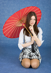 Image showing Beautiful girl with the Chinese umbrella