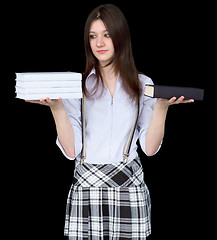 Image showing Girl with books on hands on a black