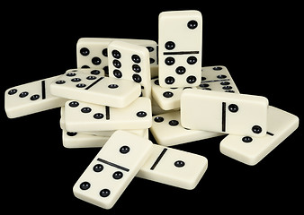 Image showing Small group from dominoes counters on a black
