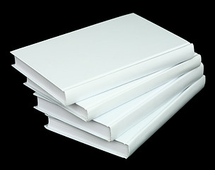 Image showing Pile from four book volumes on a black