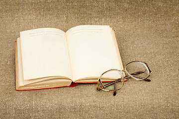 Image showing Ancient book and spectacles