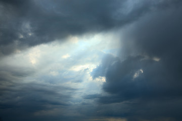 Image showing Sunshine making the way through clouds