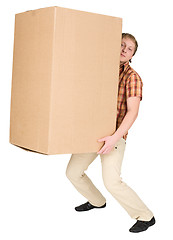 Image showing Man bears the big heavy cardboard box