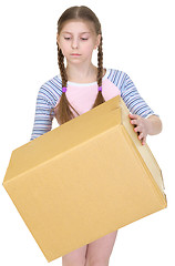 Image showing Girl holds the big cardboard box