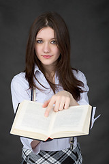 Image showing Portrait of the girl with book