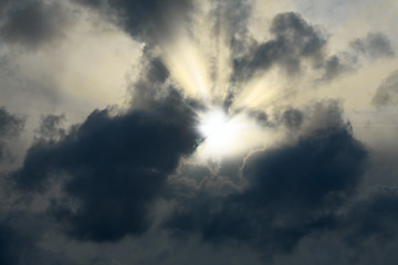 Image showing Sunshine making the way through clouds