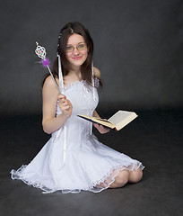 Image showing Girl - the magician with the book