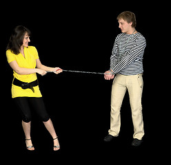 Image showing Young girl conducts on a chain of the guy