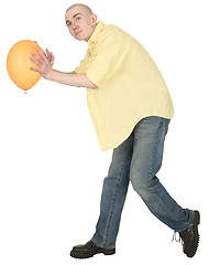 Image showing Bald guy with a yellow balloon