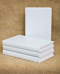 Image showing White books on the textile background