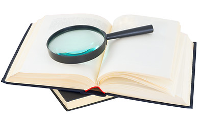 Image showing Books and magnifying glass