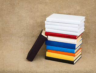 Image showing Multicolor books on the fabric background