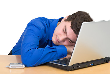 Image showing Young man sleeping from laptop