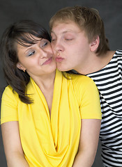 Image showing Couple kiss on a black background