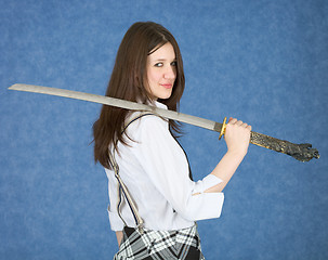 Image showing Young girl with sword