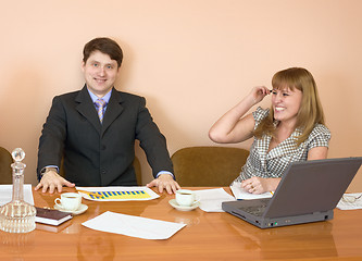 Image showing Business people sits at the table