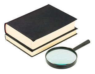 Image showing Books and magnifying glass