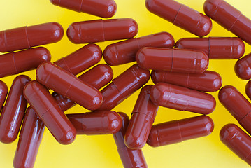 Image showing Red capsules