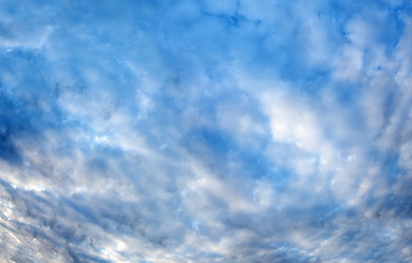 Image showing Plumose clouds in the dark blue sky