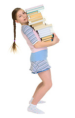 Image showing Girl with heap of books