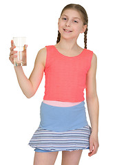 Image showing Young girl with glass of water