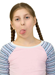 Image showing Young girl to put out one's tongue