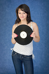 Image showing Portrait of the girl with a phonograph record