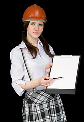 Image showing Beautiful girl in a helmet with tablet and pencil