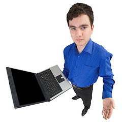 Image showing Young businessman with the laptop