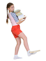 Image showing Girl hold heap of books